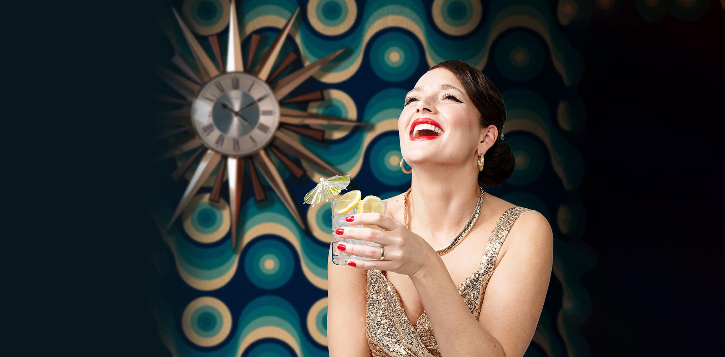 Lady in a party dress, drinking a gin and tonic