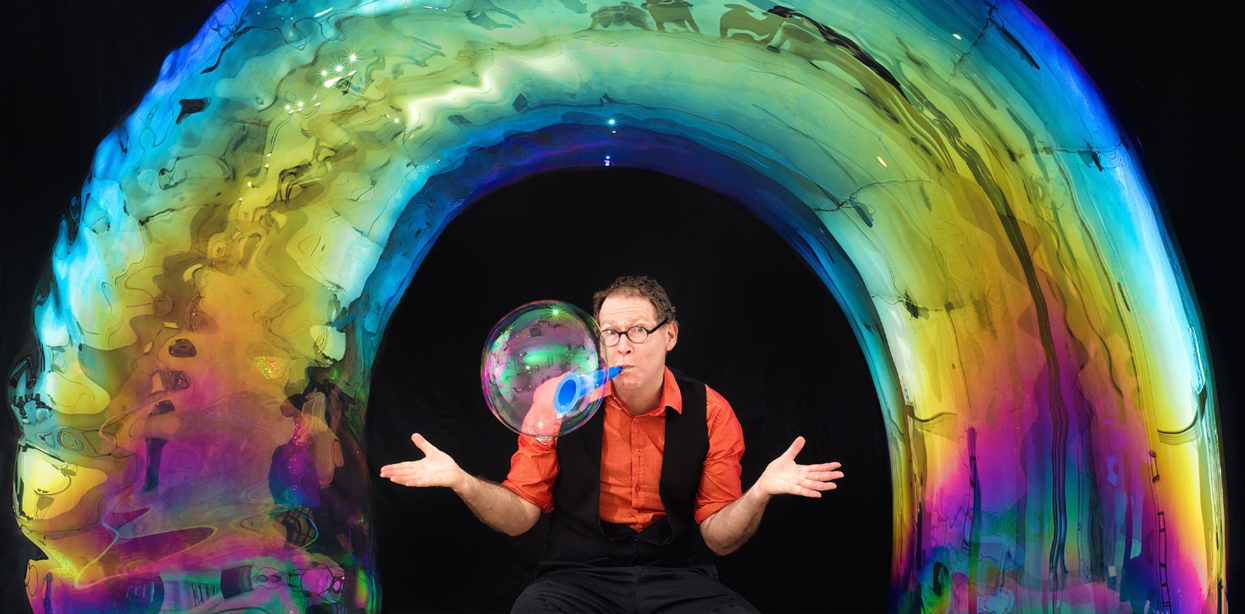 A person blowing a large bubble