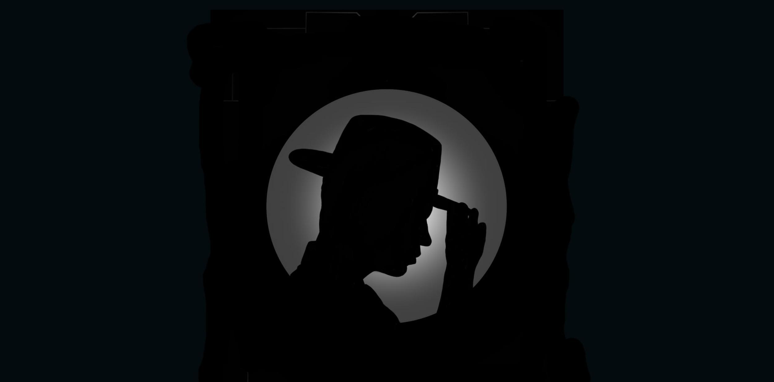 Silhouette of person wearing a fedora hat