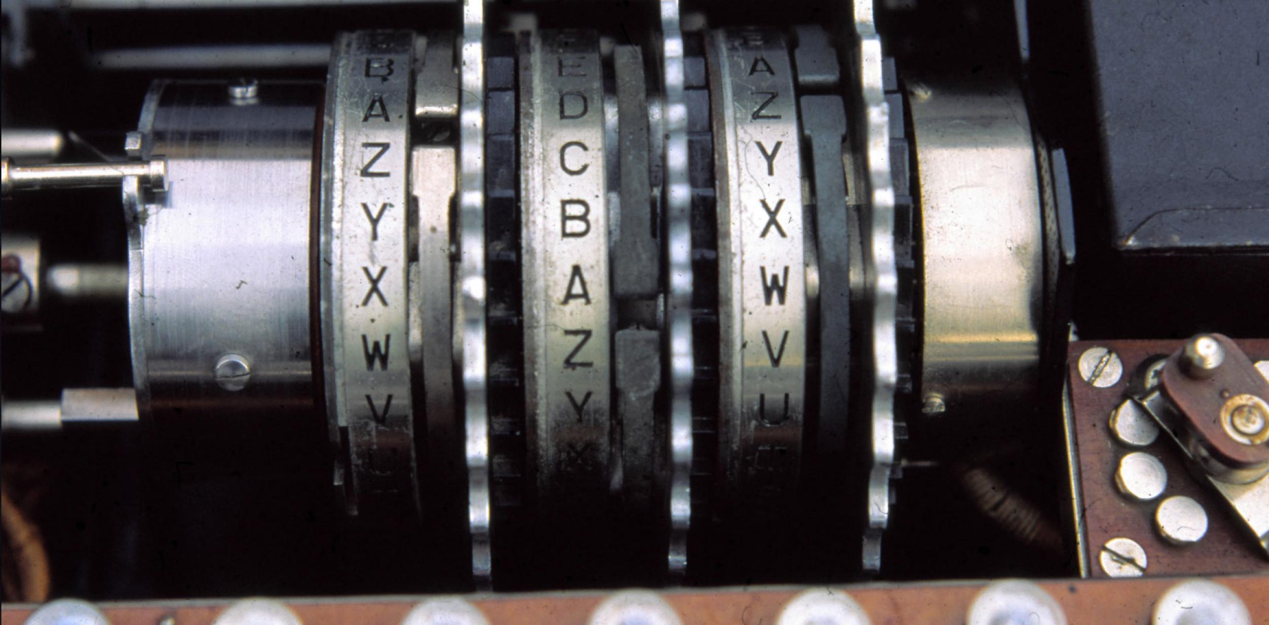 Close up of the Enigma machine showing dials of the alphabet.