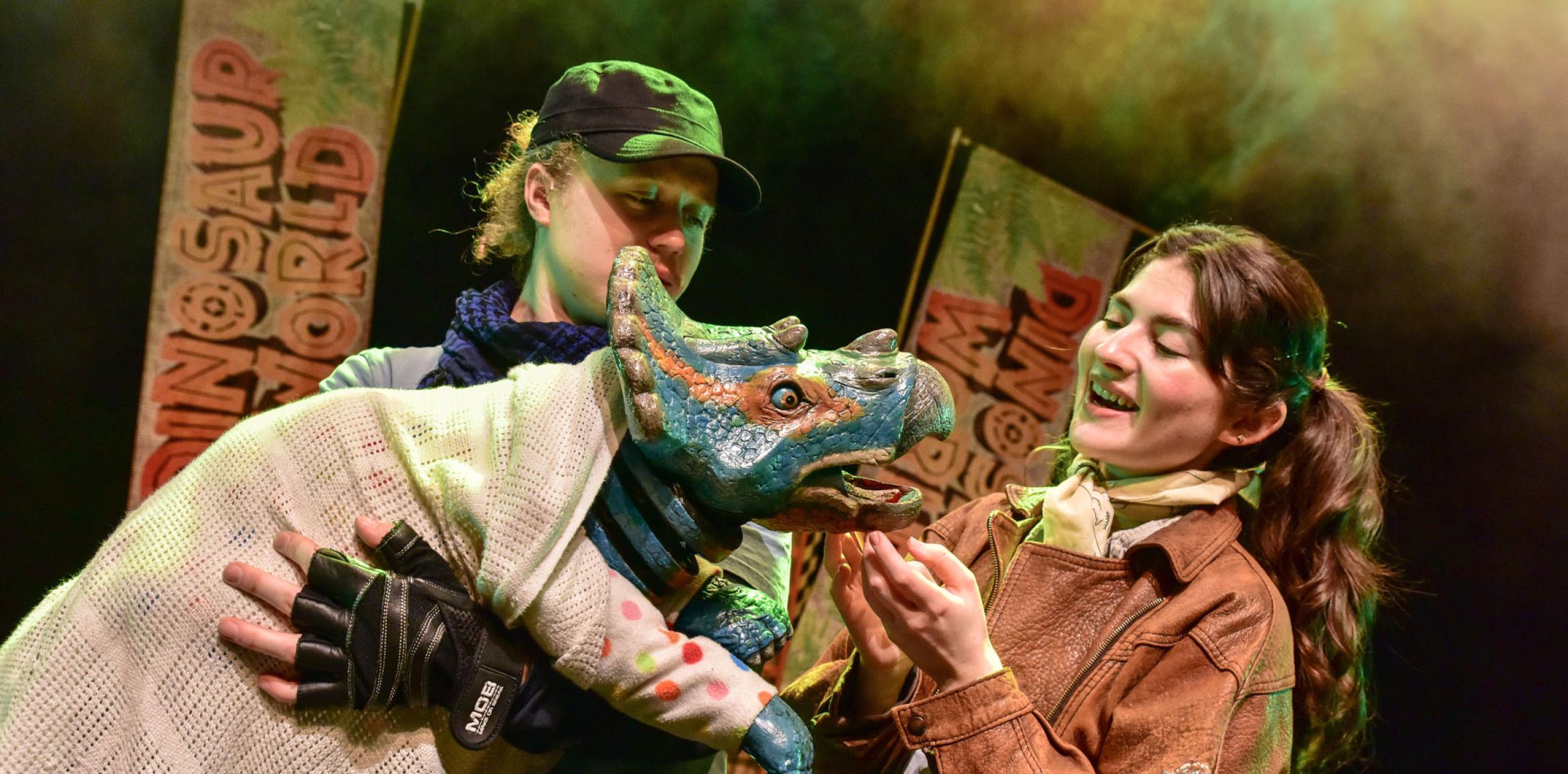 Dinosaur puppet with 2 puppeteers