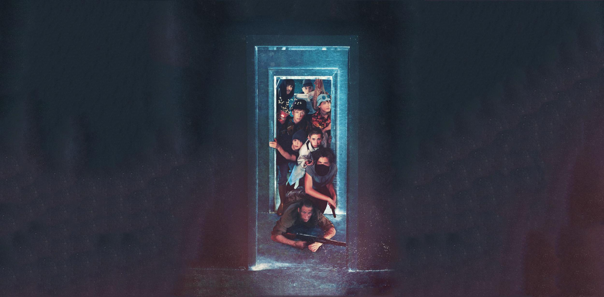 A number of people squeezing through a doorway