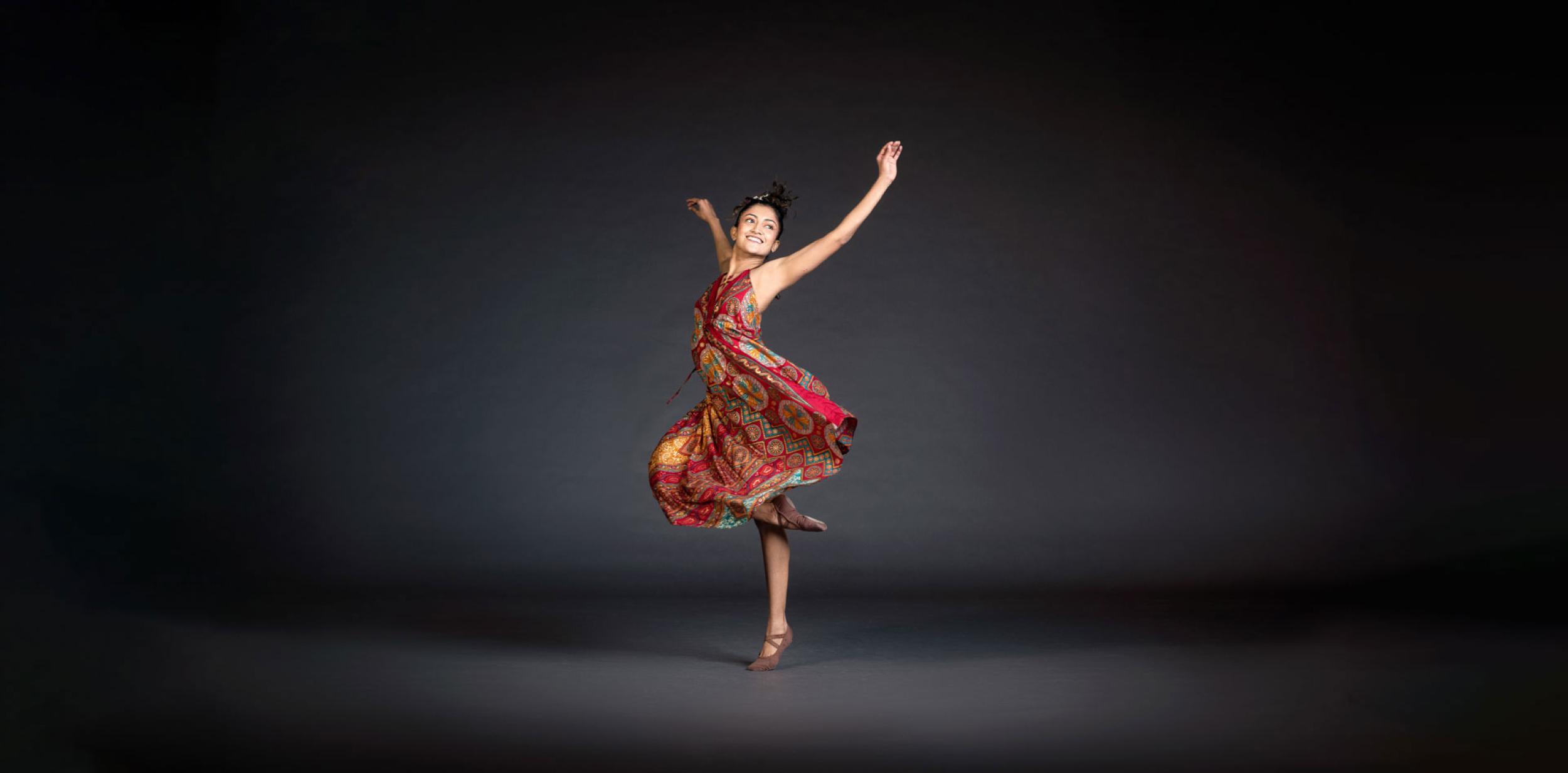 Female ballet dancer on an empty stage