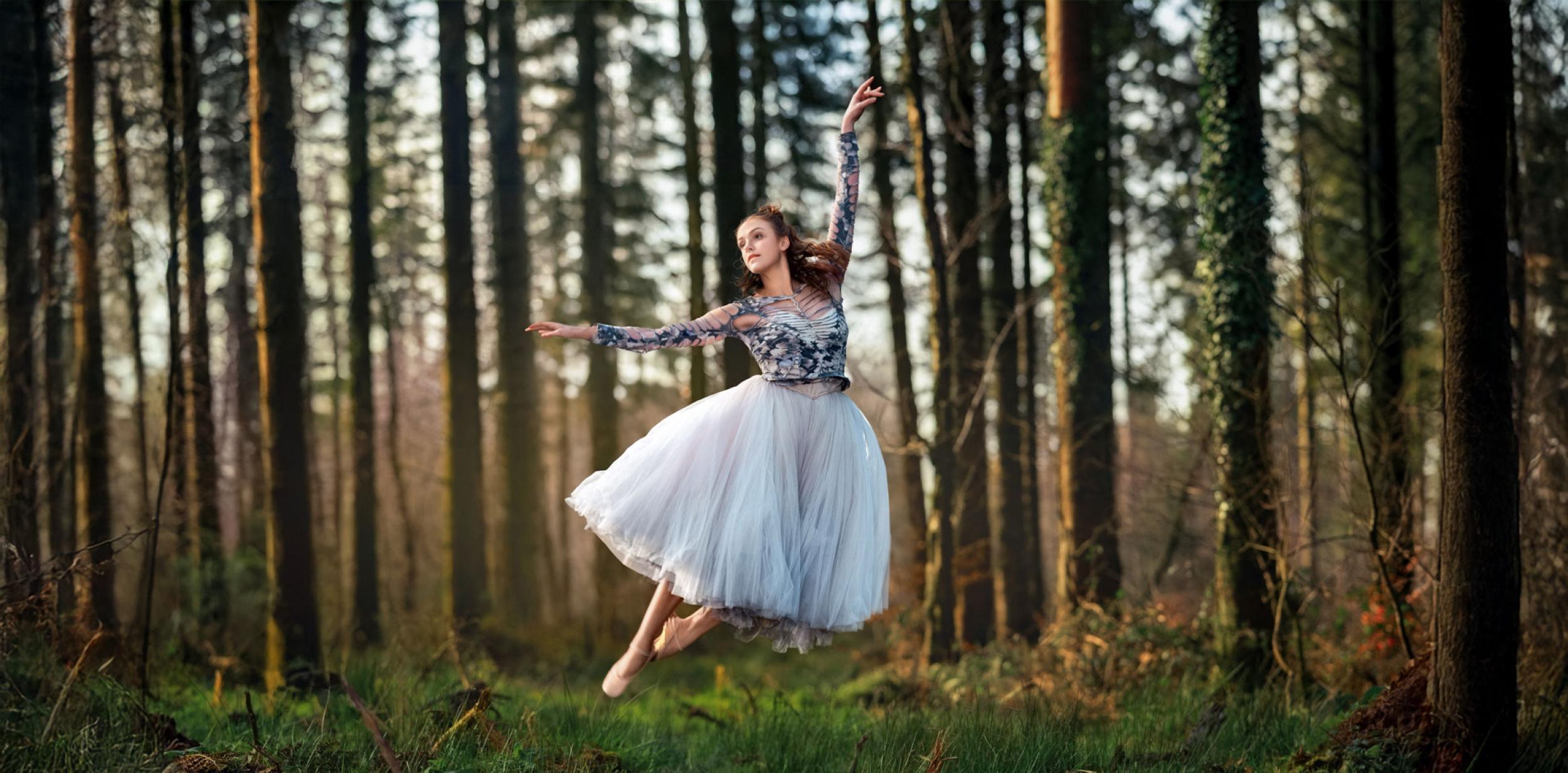 A ballet dancer in the woods