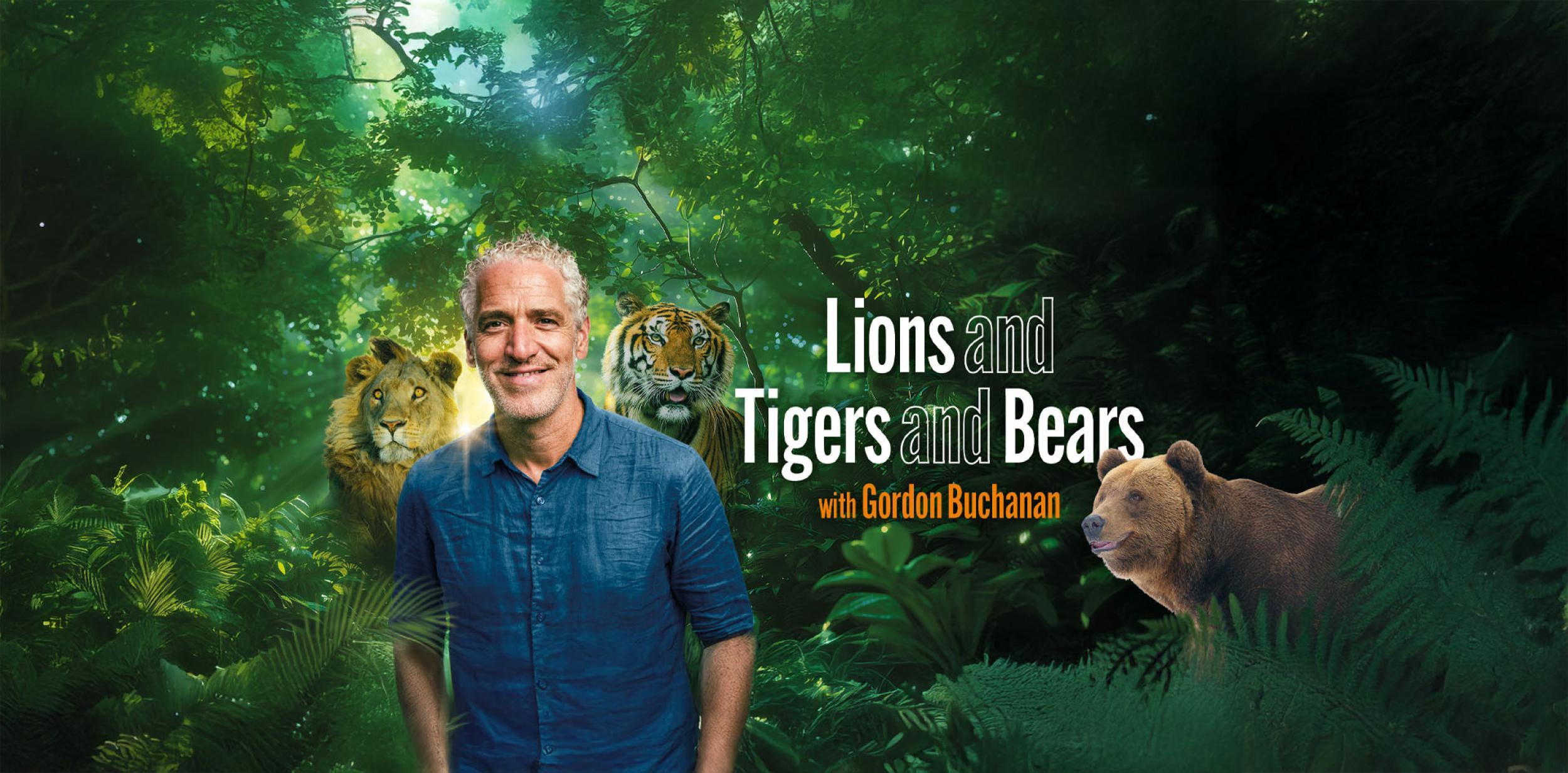 Gordan Buchanan in a forest alongside a lion, tiger and a bear.