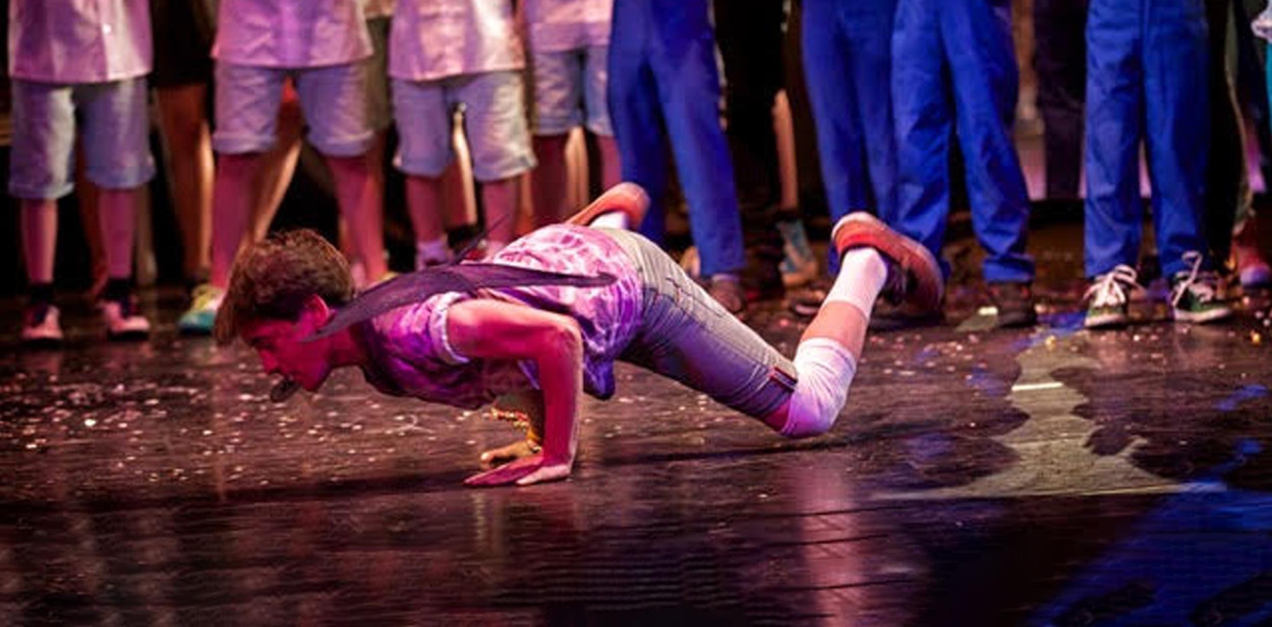 Young boy break dancing