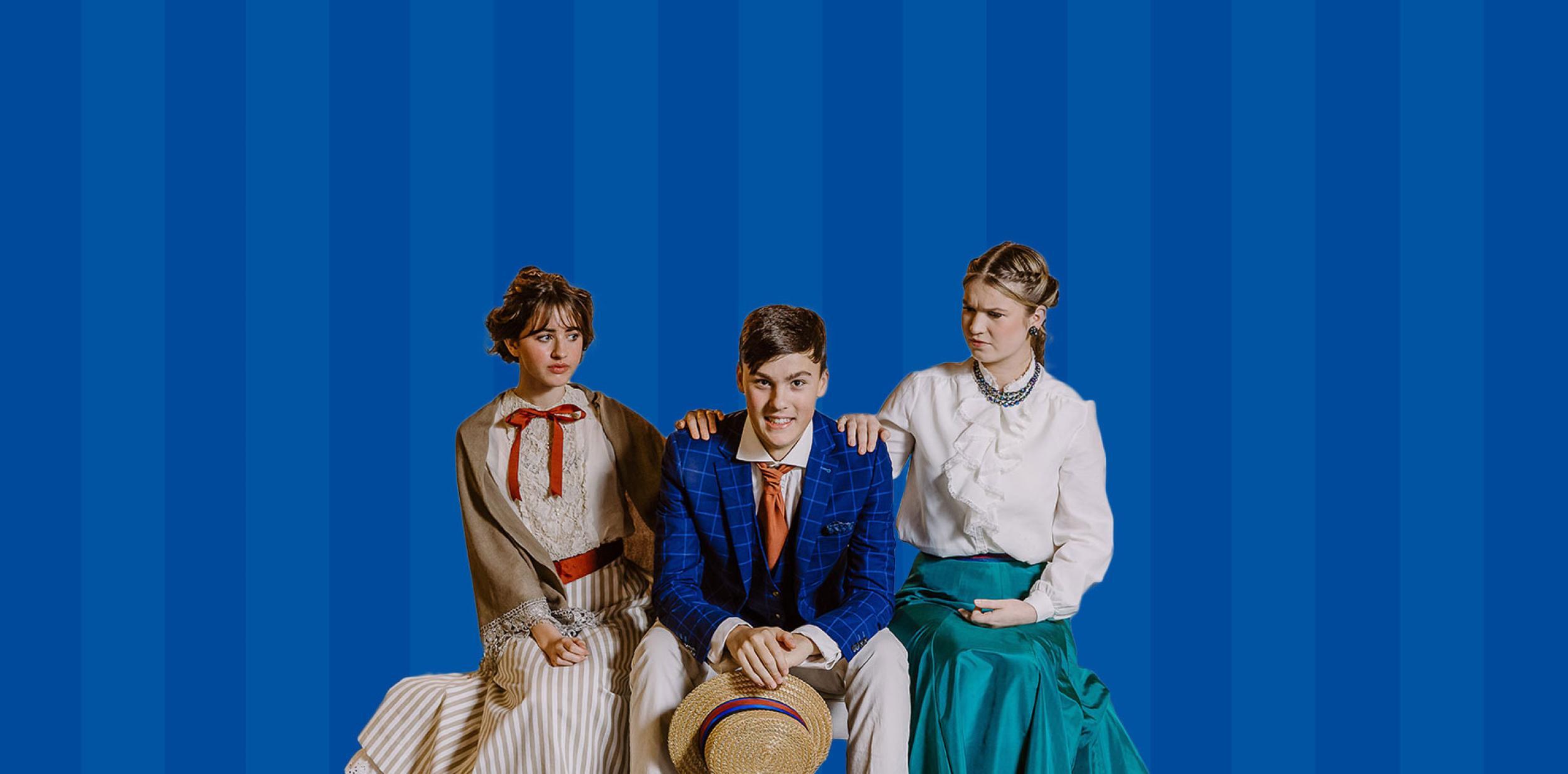 Three young people in period costume