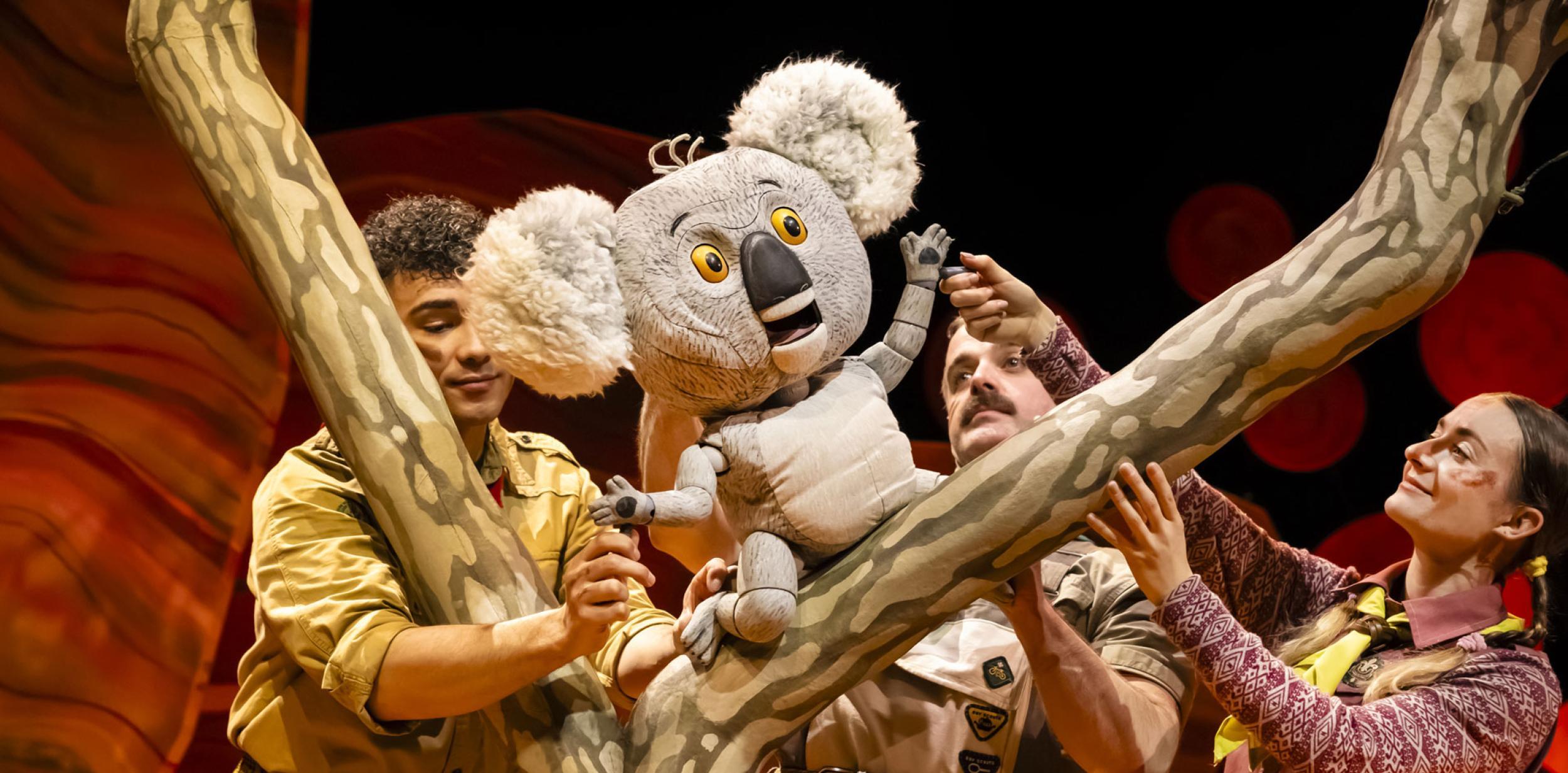 A friendly koala bear puppet