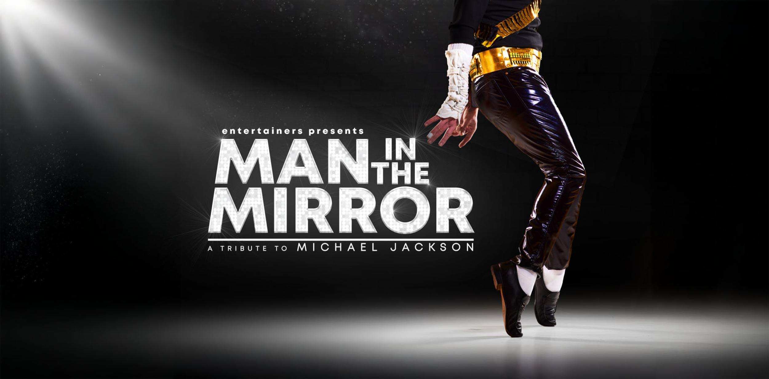 Text: Man in the Mirror and spotlight on "Michael Jackson's" leg in his classic dance move