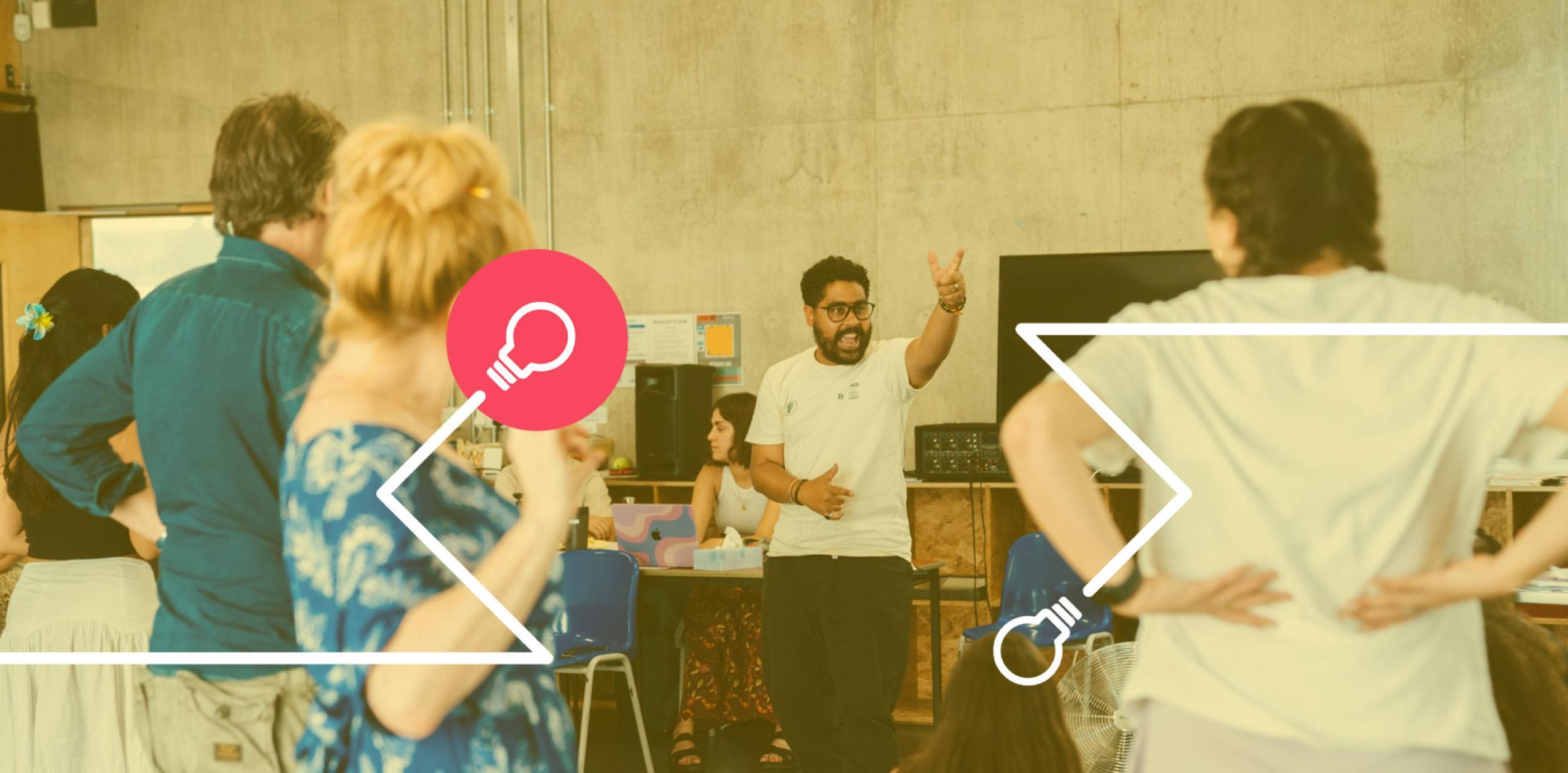 Robin Belfield delivering a workshop to a group of people