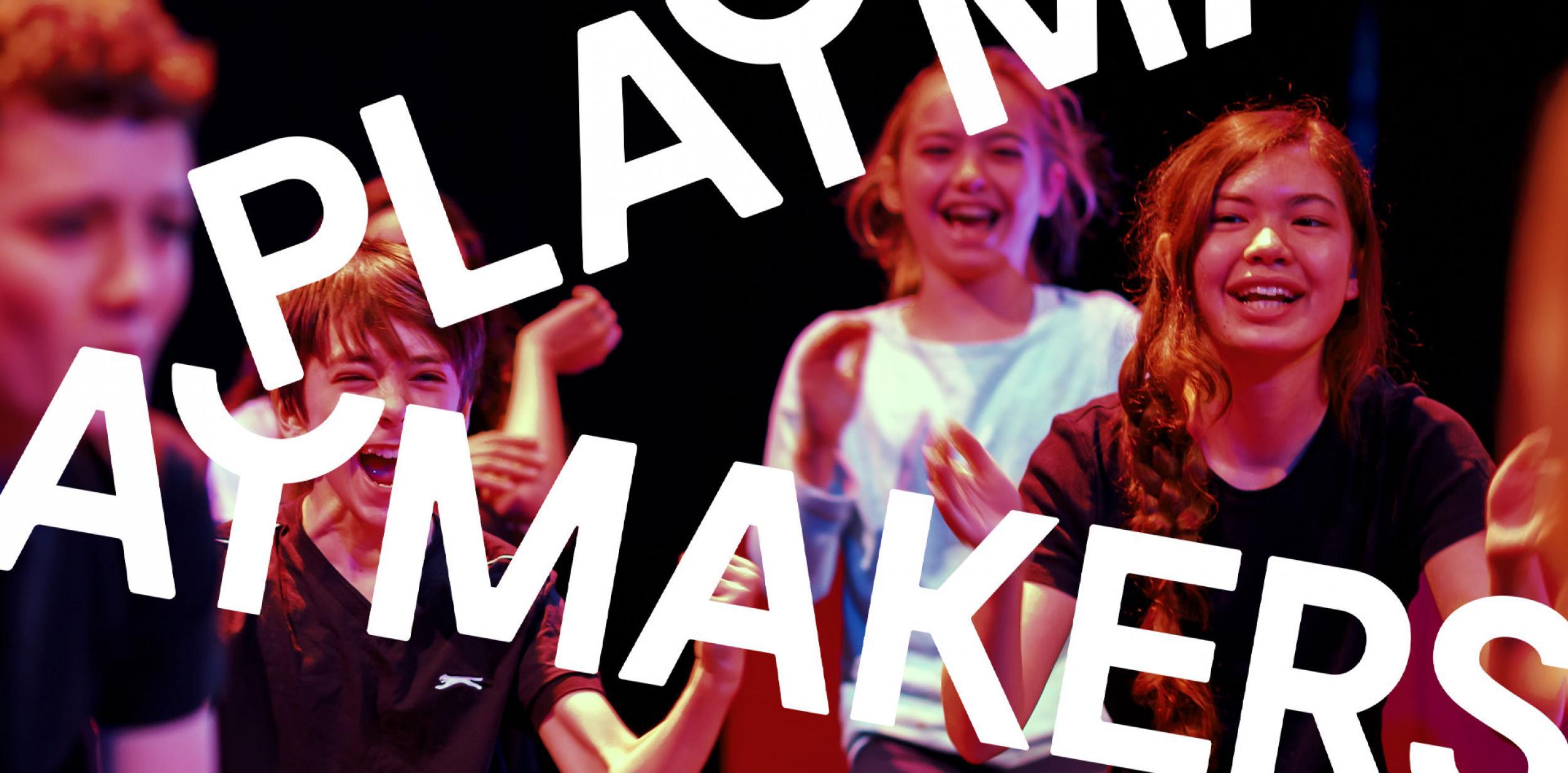 Group of smiling children in a workshop