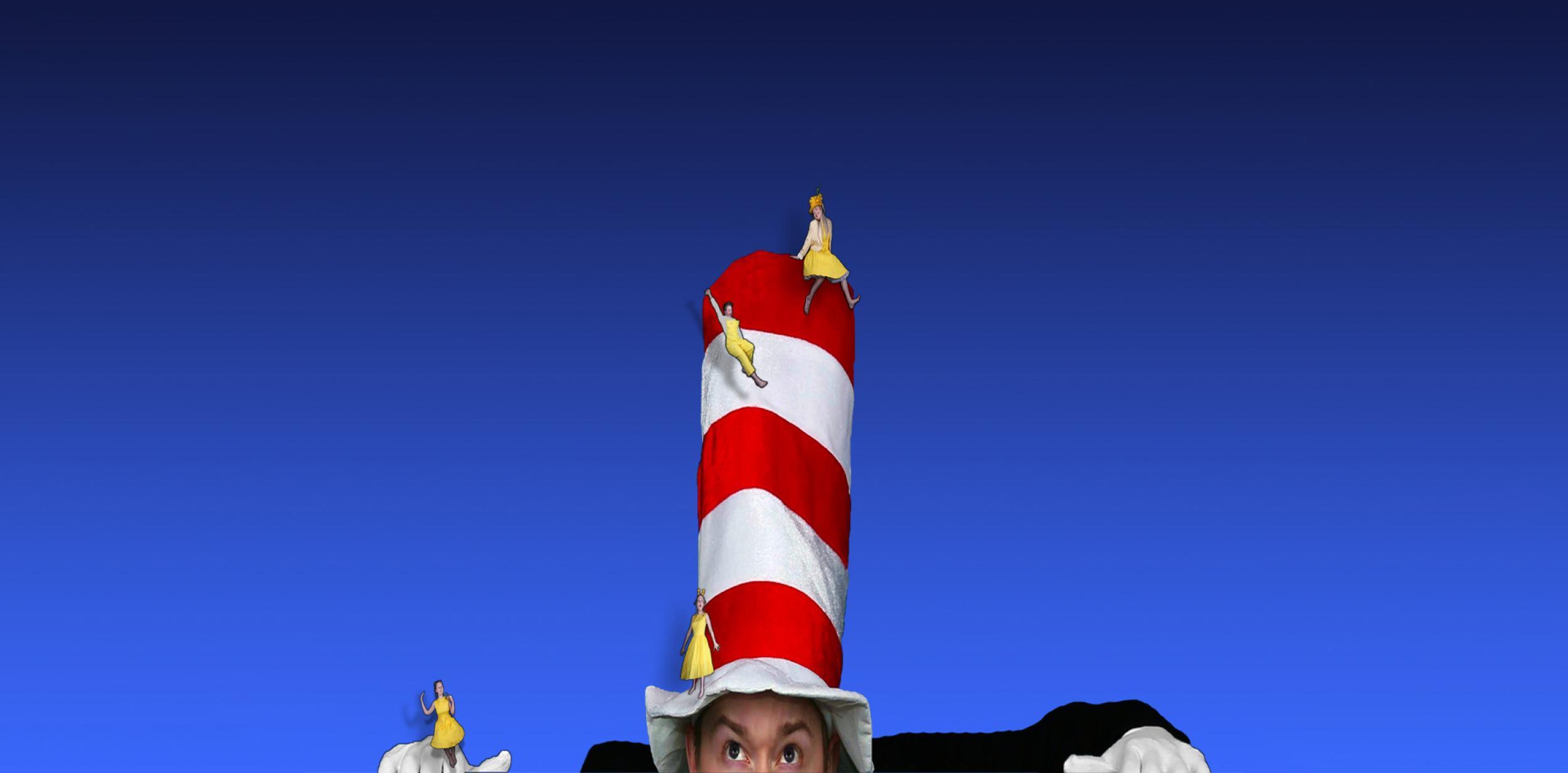 Man in a large red and white stripey hat against a blue background