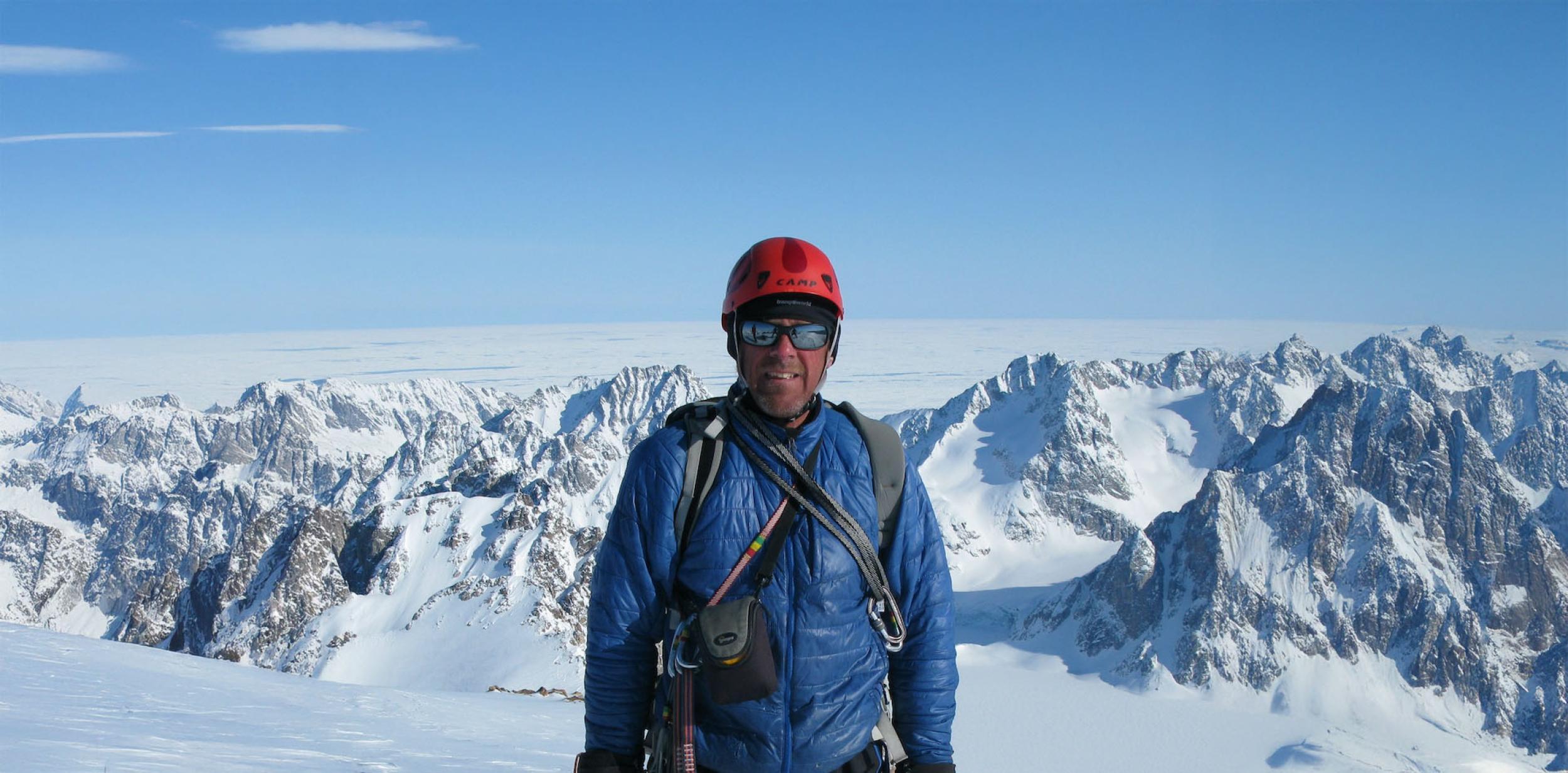 Simon Yates on a snowy mountain range.