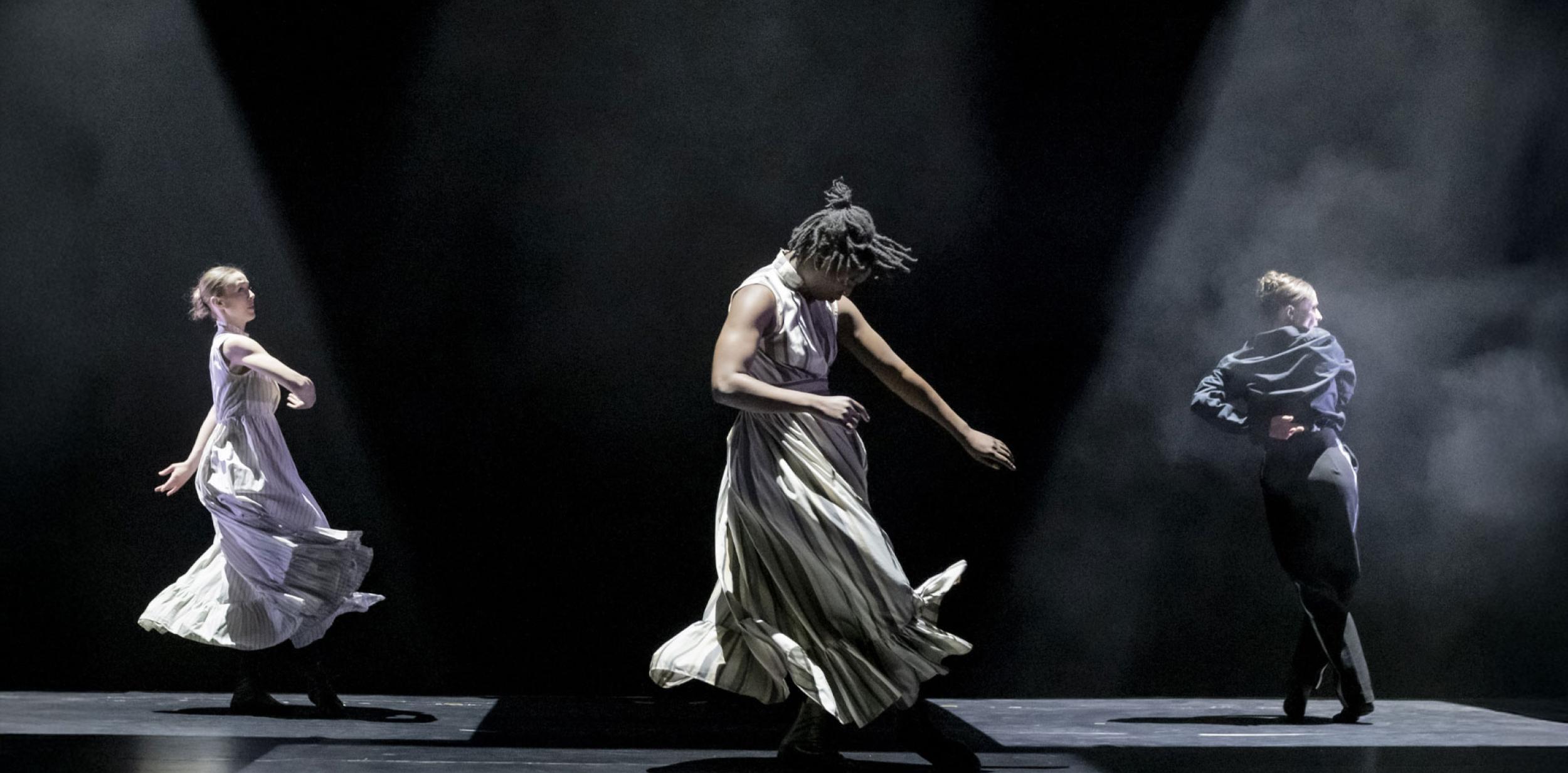 Contemporary dancers performing on stage
