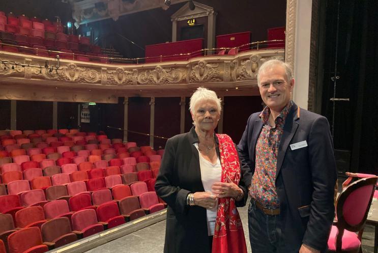 Judi Dench with Deryck Newland on stage at Theatre Royal Winchester