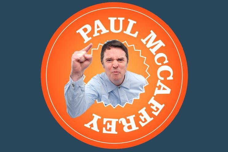 Paul McCaffrey popping out of banner