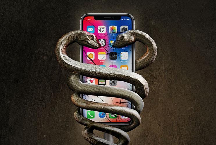 Two serpents wrapped around a mobile phone