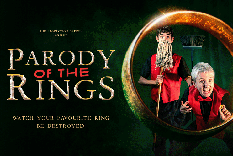 Parody of the Rings logo. Two people surrounded by a large gold ring. One person is holding a mop.