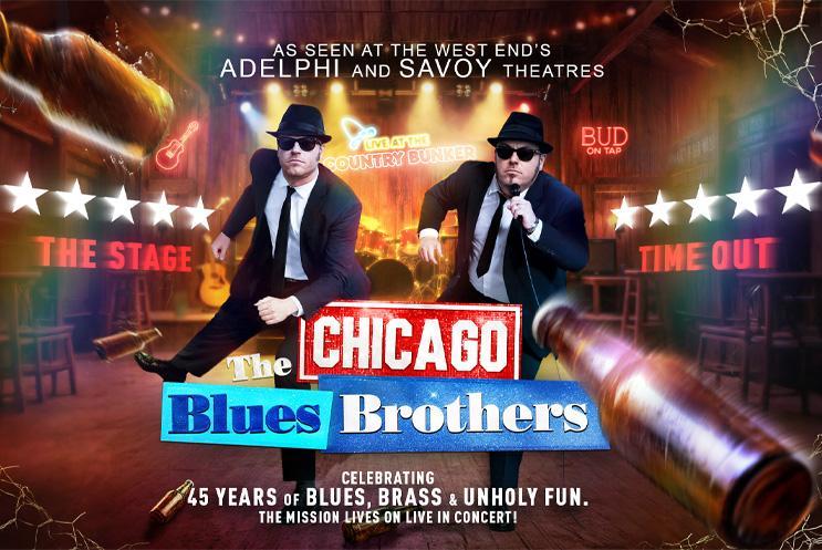 Men in suits running in a bar. Text: The Chicago Blues Brothers