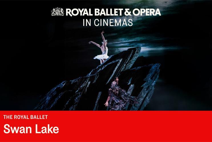 A ballet dancer dressed in white dancing on a dark structure. Text: Swan Lake