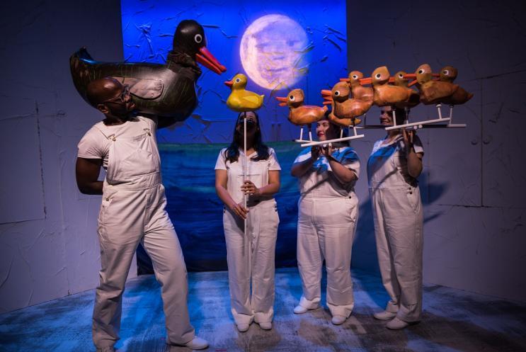 Duck puppets and puppeteers