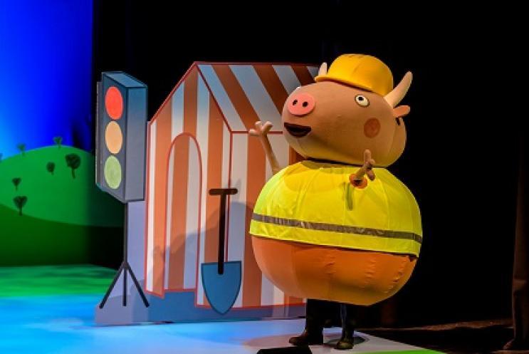 Peppa pig character on stage