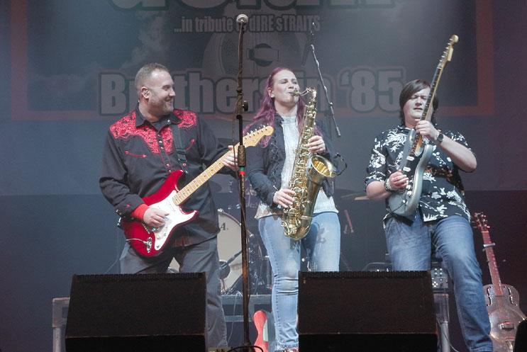 A band performing live on stage