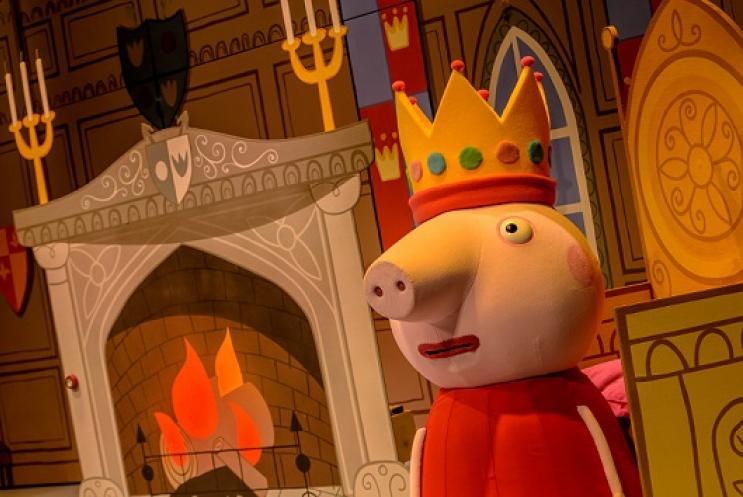 Peppa Pig character wearing a crown
