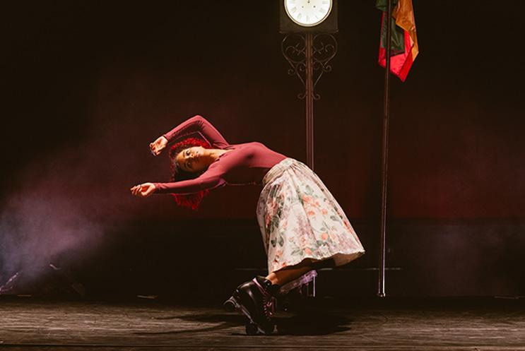 Woman bending backward on roller skates