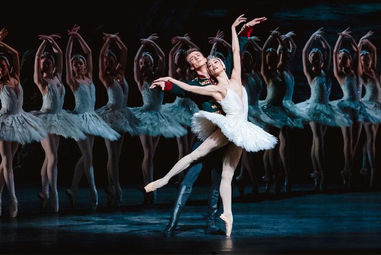 Two ballet dancers dancing together.