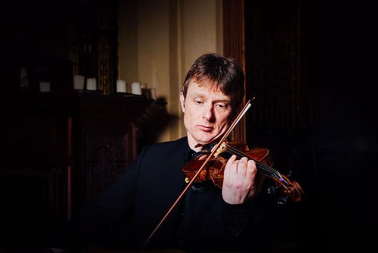 A person playing the violin