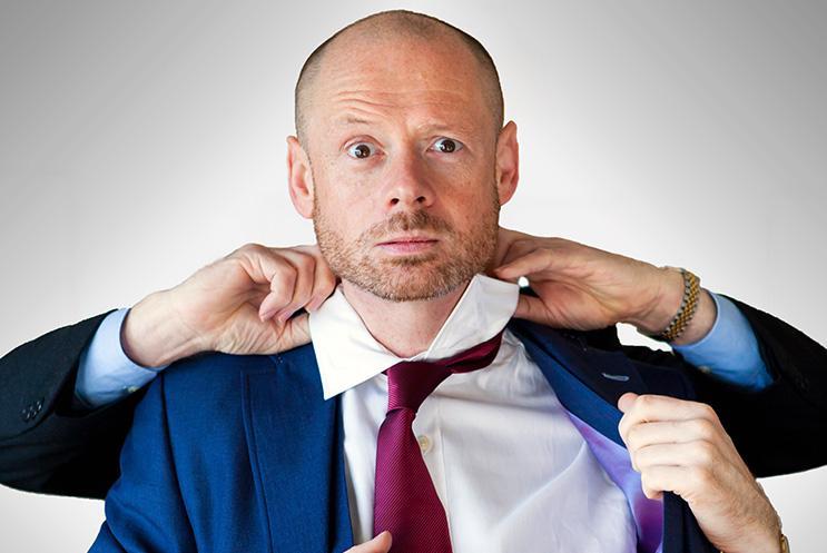 Alistair Barrie in shirt and tie with someone pulling collar from behind