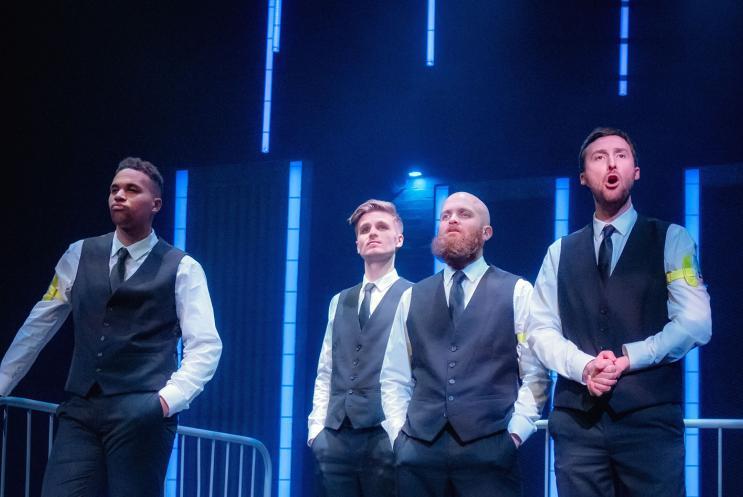 Four bouncers stood together