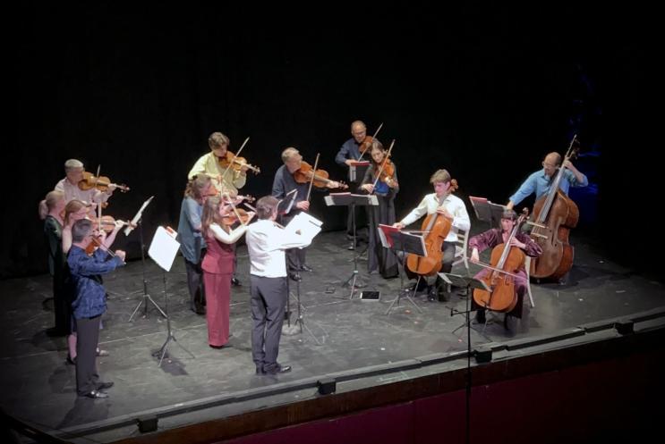 A musical orchestra on a stage