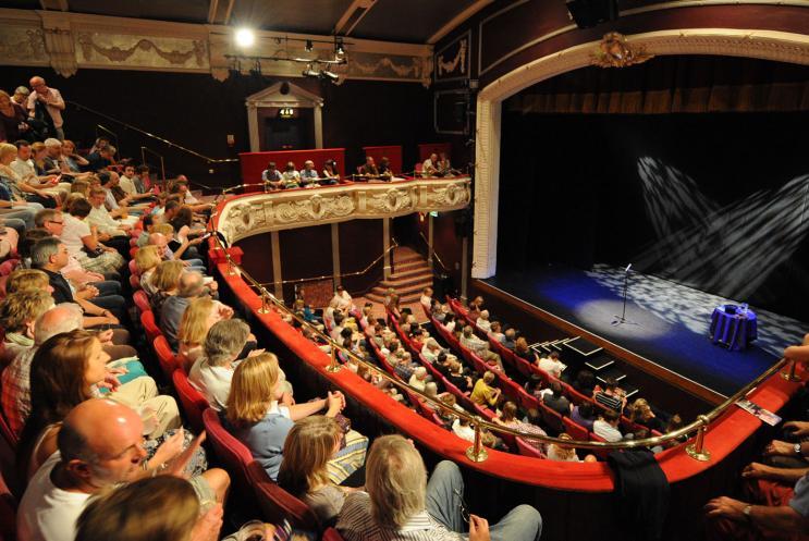 A full auditorium of people about to watch a show