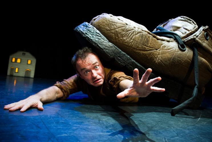 Jack is trapped under a giant's boot.