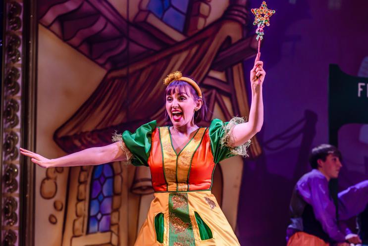 fairy casting a spell on stage
