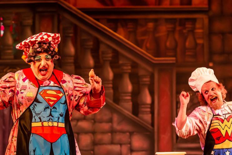 Panto characters performing on stage