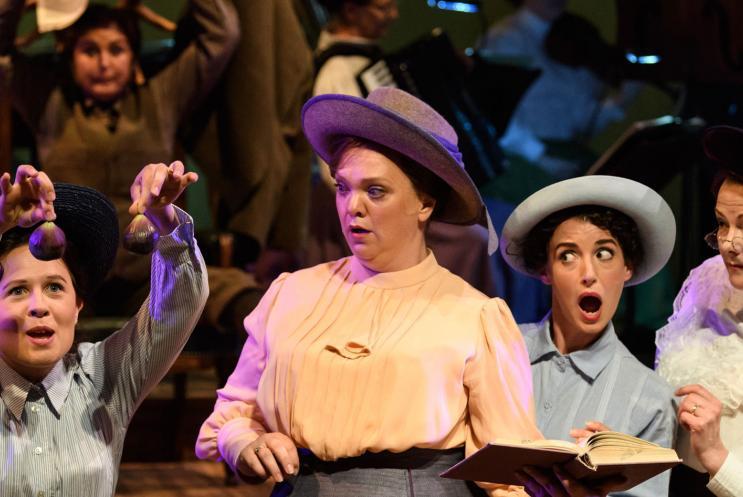 A group of women looking shocked and appalled 