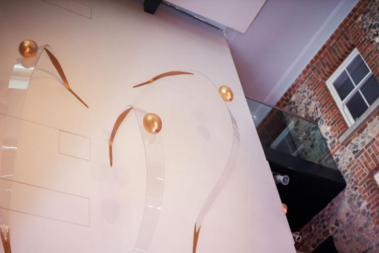 A sculpture on a wall